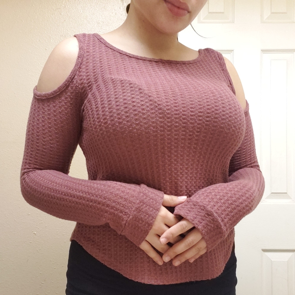 A long sleeve pink shirt